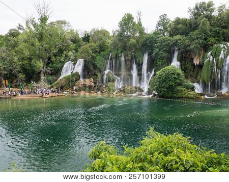 Beautiful Kravica Waterfall In Bosnia And Herzegovina - Popular Swimming And Picnic Area For Tourist