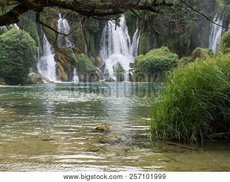 Beautiful Kravica Waterfall In Bosnia And Herzegovina - Popular Swimming And Picnic Area For Tourist
