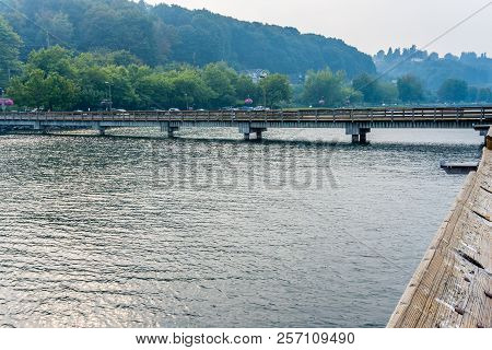 Smoke From Fires Creates A Haze Over A Pier And The Shoreline In Ruston, Washington.