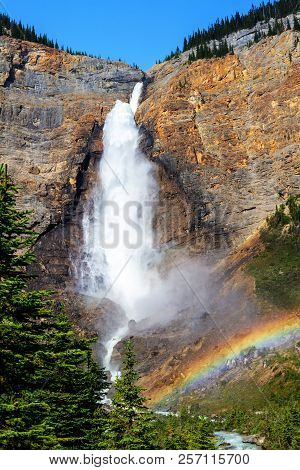 Powerful Takakkaw Falls In Yoho National Park Near Field, British Columbia, Canada, With Rainbow At 