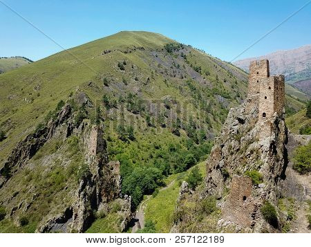 Aerial View From The Drone. Mountain Ingushetia, Medieval Tower Complex Vovnushki-stone Towers Stand