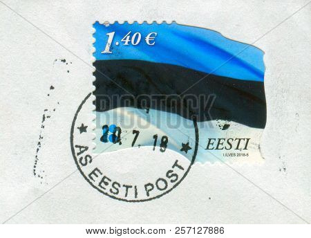 GOMEL, BELARUS, 30 AUGUST 2018, Stamp printed in Estonia shows image of the Flag, circa 2018. 