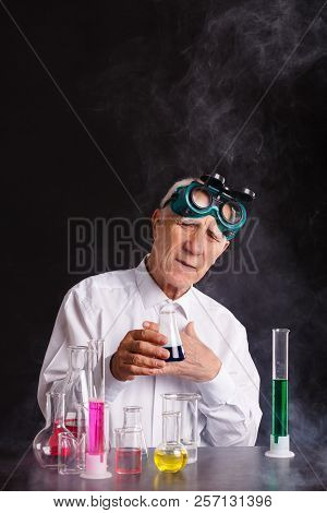 An Old Chemist Provides Experiments. Crazy Scientist