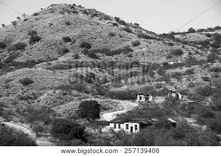 Buildings Below A Hill In Ruby, Arizona