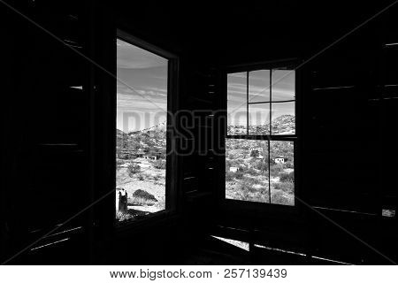 Looking Out Of Windows On The Ghost Town Of Ruby, Arizona