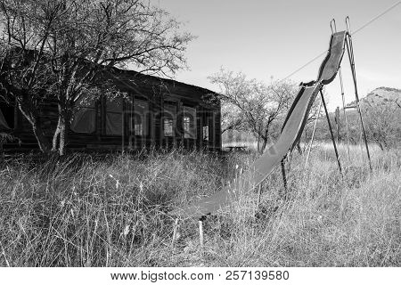 Slide Outside Of Old School House, Ruby, Arizona
