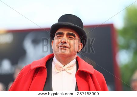 Elio walks the red carpet ahead of the 'The Sisters Brothers' screening during the 75th Venice Film Festival at Sala Grande on September 2, 2018 in Venice, Italy.
