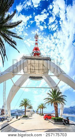 Unusual Foreshortening Of A Giant Snow-white Crane In The Port Of Porto Montenegro Against The Backg