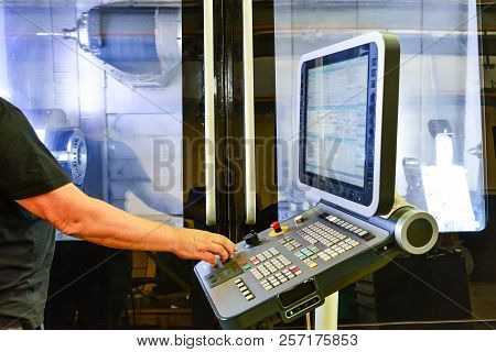 Worker, Operator Of The Control Panel Of The Program Of Operation Of A High-precision Cnc Machining 