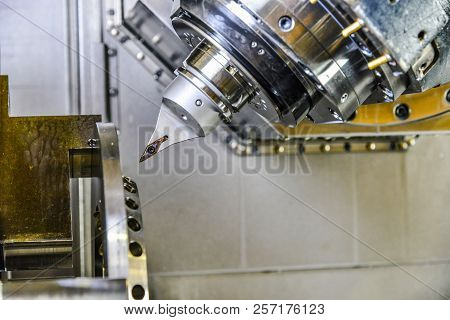 Cnc Router And Turning Metal With A Cutting Tool And Centering Tool. The Concept Of High-tech Proces