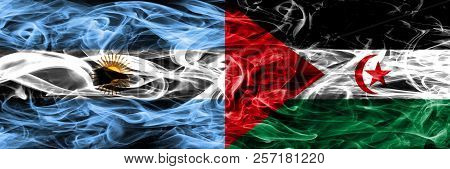 Argentina Vs Sahrawi Smoke Flags Placed Side By Side. Thick Colored Silky Smoke Flags Of Argentinian