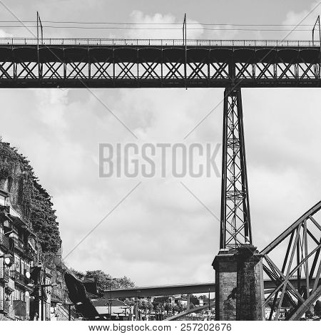 Bridge Built By Eiffel On The Bacground Of The Historical Centre Of The City Of Porto With Tradition
