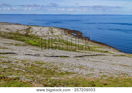 Fanore Beach In Burren Mountain With Aran Islands In Background