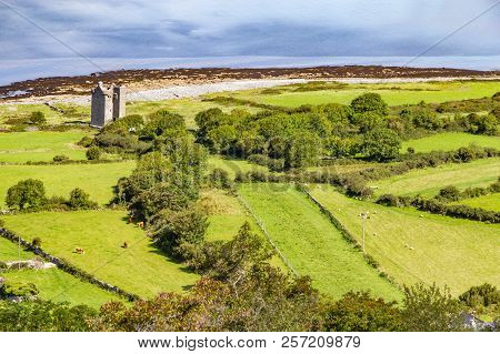 Old Rock Tower, Farm And Beach In Ballyvaughan