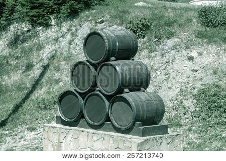 Advertising Design From Old Oak Barrels On The Edge Of Vineyards And Winery. Countryside Of Russia A