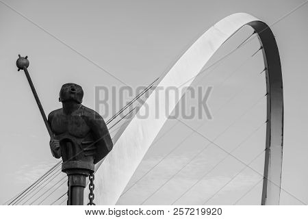 Newcastle, England - August 2, 2018: Modern Sculpture In Front Of The Millennium Bridge  In Black An