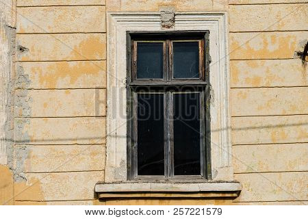 Old Window On Abandoned Residentual House Close Up Shot On A Sunny Day.