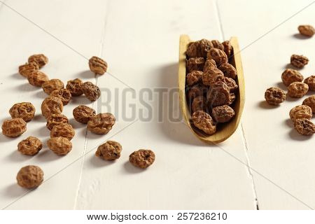 Tigernuts / Earth Almonds / Nutsedges On White Surface