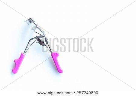 Making Eyelash Curler On A White Background.