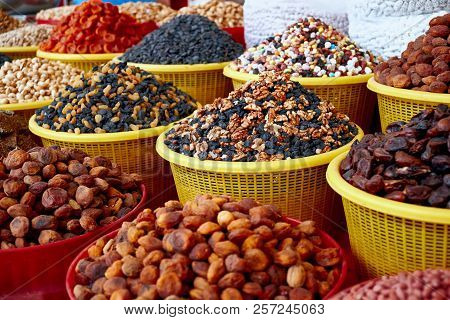 Counter With Nuts And Dried Fruits On The Market In Central Asia.
