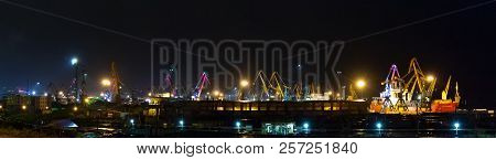 Murmansk, Russia - 27 August, 2018: Night Panorama Of The Murmansk Sea Port In Russia, Cranes, нeavy