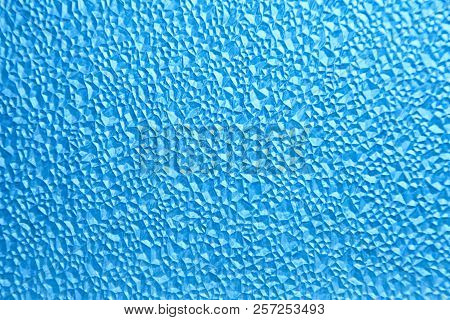 Abstract Polygonal Pattern On A Blue Plastic Window On The Lumen