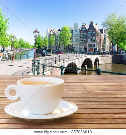 Cup Of Coffee With View Of Amsterdam, Holand Netherlands