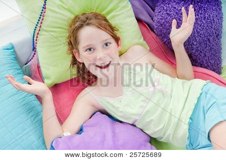 young girl looking happy while relaxing