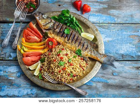 Grilled Sea Bass On Coper Plate, Moroccan Style, Copy Space