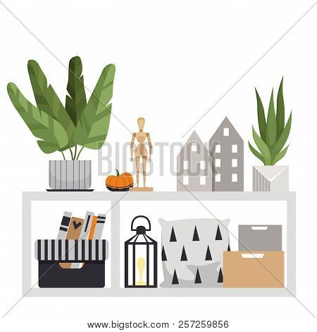 Floor Table With Interior Items. A Plant, Pillows, Boxes, A Wooden Figurine, A Pumpkin, Small Houses