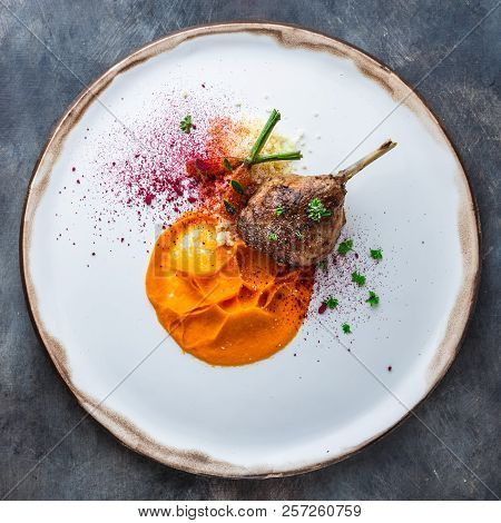 Duck Leg Confit With Batat Puree, Carrots And Couscous, Restaurant Meal