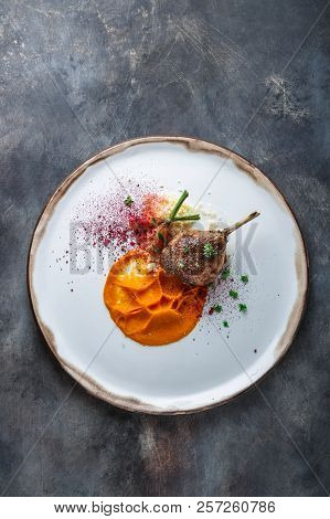 Duck Leg Confit With Batat Puree, Carrots And Couscous, Restaurant Meal, Copy Space