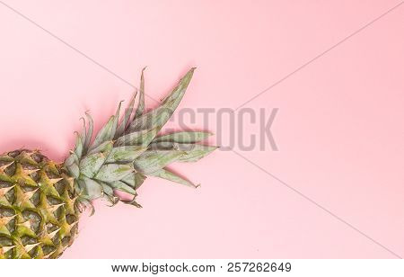 Half Cut Juicy Pineapple On A Pastel Pink Background. Minimal Summer Concept