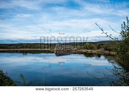 Remerschen, Luxembourg - April 15, 2018: Panoramic View Of The Lake In The Nature Reserve Haff Reime