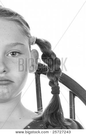 upset girl sitting in chair