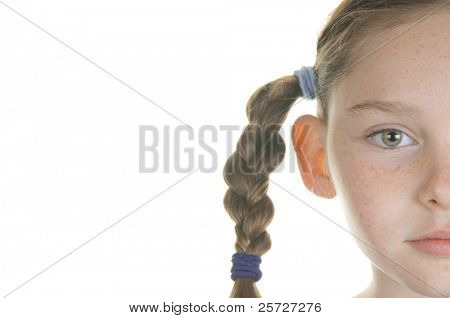 girl serious in braids