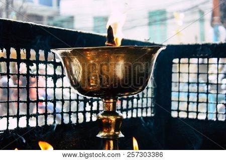 Kathmandu Nepal September 1, 2018 Closeup Of Candles Burning Front A Temple At Durbar Square In Kath
