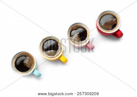 Row Of Cups With Aromatic Coffee On White Background, Top View