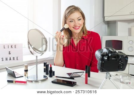 Cheerful Female Vlogger Showing Her Brush For Make Up, Recording Beauty Video Blog. Like And Share C