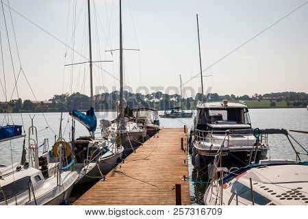 Ryn, Warmia-masuria Province / Poland - July 31, 2018: Marina And Pier On Rynskie Lake, Town Of Ryn.