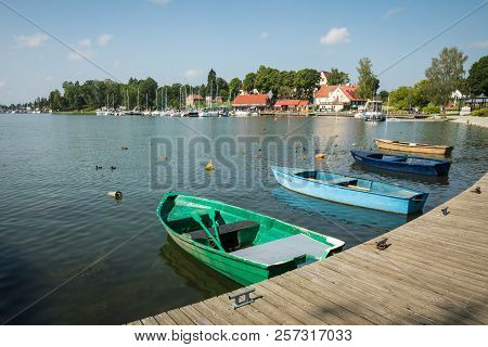 Ryn, Warmia-masuria Province / Poland - July 31, 2018: Marina And Pier On Rynskie Lake, Town Of Ryn.