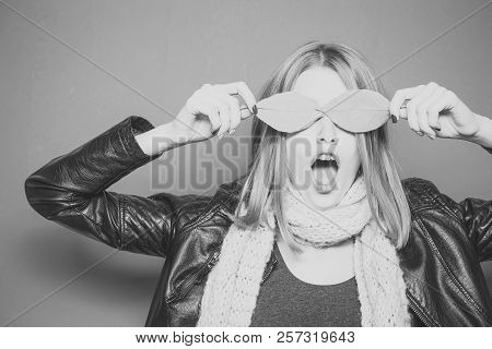 Surprised Model With Stylish Hair In Scarf. Beauty And Fashion. Girl With Orange Leaves On Pink Back