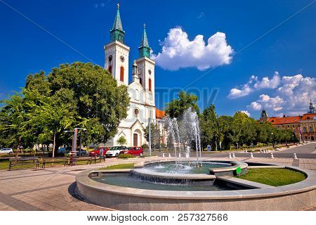 Church And Fountain In Sombor Street View, Vojvodina Region Of Serbia