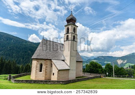 An Old Church In The Village Of Santa Fosca In The Italian Dolomites