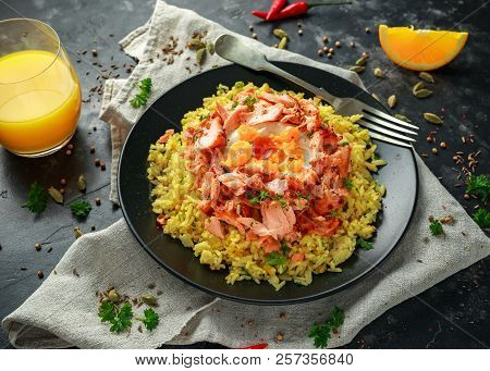Traditional Indian-english Kedgeree Breakfast: Basmati Rice With Egg Benedict And Hot Smoked Sweet C