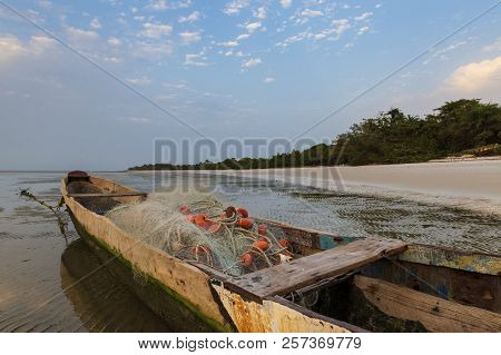 Traditional Fishing Canoe At The Beach In The Island Of Orango At Sunset, In Guinea Bissau. Orango I