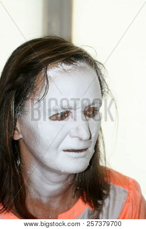 Face In White Foam. Panthenol On The Skin Of The Face. Scary Face.