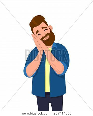 Young Man Sleeping Tired Dreaming And Posing With Hands Together While Closed Eyes.  Calm Relaxed Gu