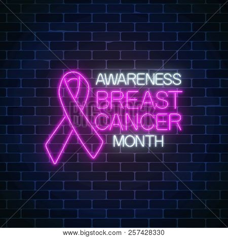 Glowing Neon Sign Of Breast Canser Awareness Month In October. Neon Poster Design With Pink Ribbon