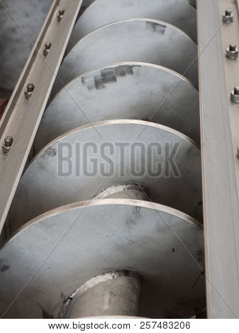 Detail Of Stainless Steel Screw Conveyor For A Food Processing Plant.